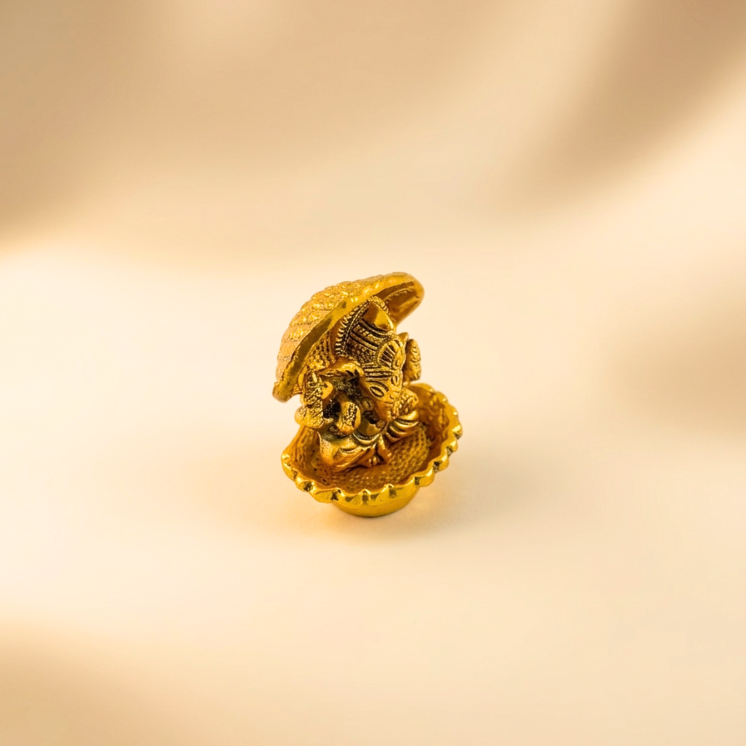 Handcrafted Seep Ganesha Idol – Antique Gold Seashell Ganpati for Home Decor &Premium Gifting | Gulabi Craft